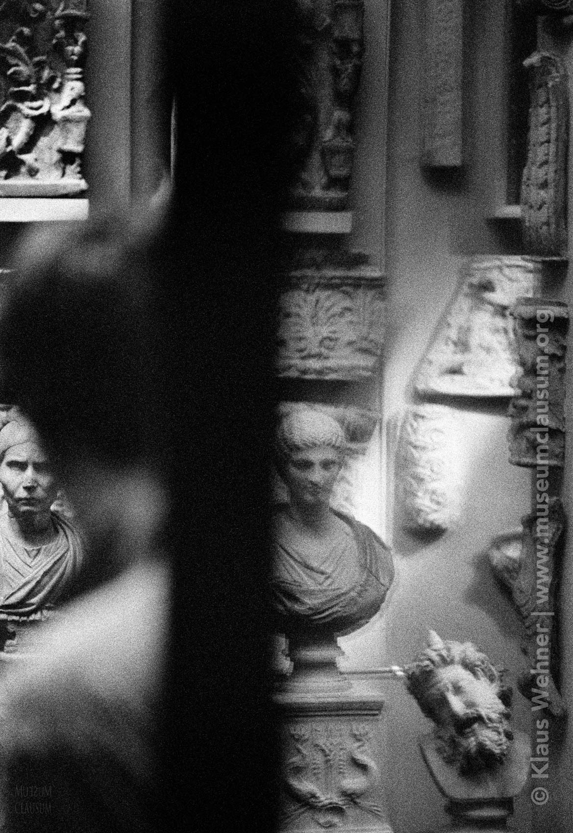 Sir John Soane's Museum: Black and white crop of busts and a silhouette in the Dome area.